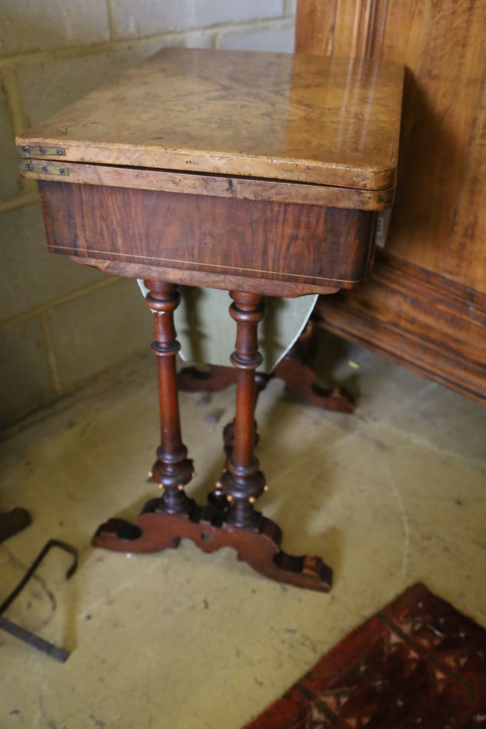 A Victorian burr walnut games / work table, width 53cm, depth 40cm, height 70cm